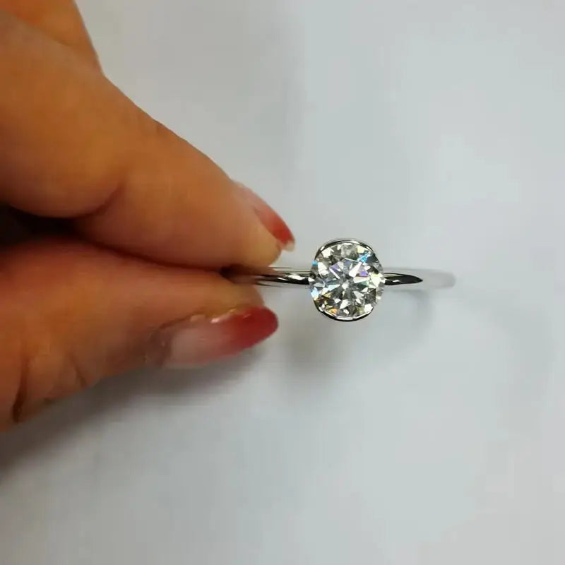 Round Solitaire Engagement Ring in Sterling Silver & Moissanite 